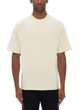Unisex heavyweight knitted crewneck T-shirt in Apricot – front model view