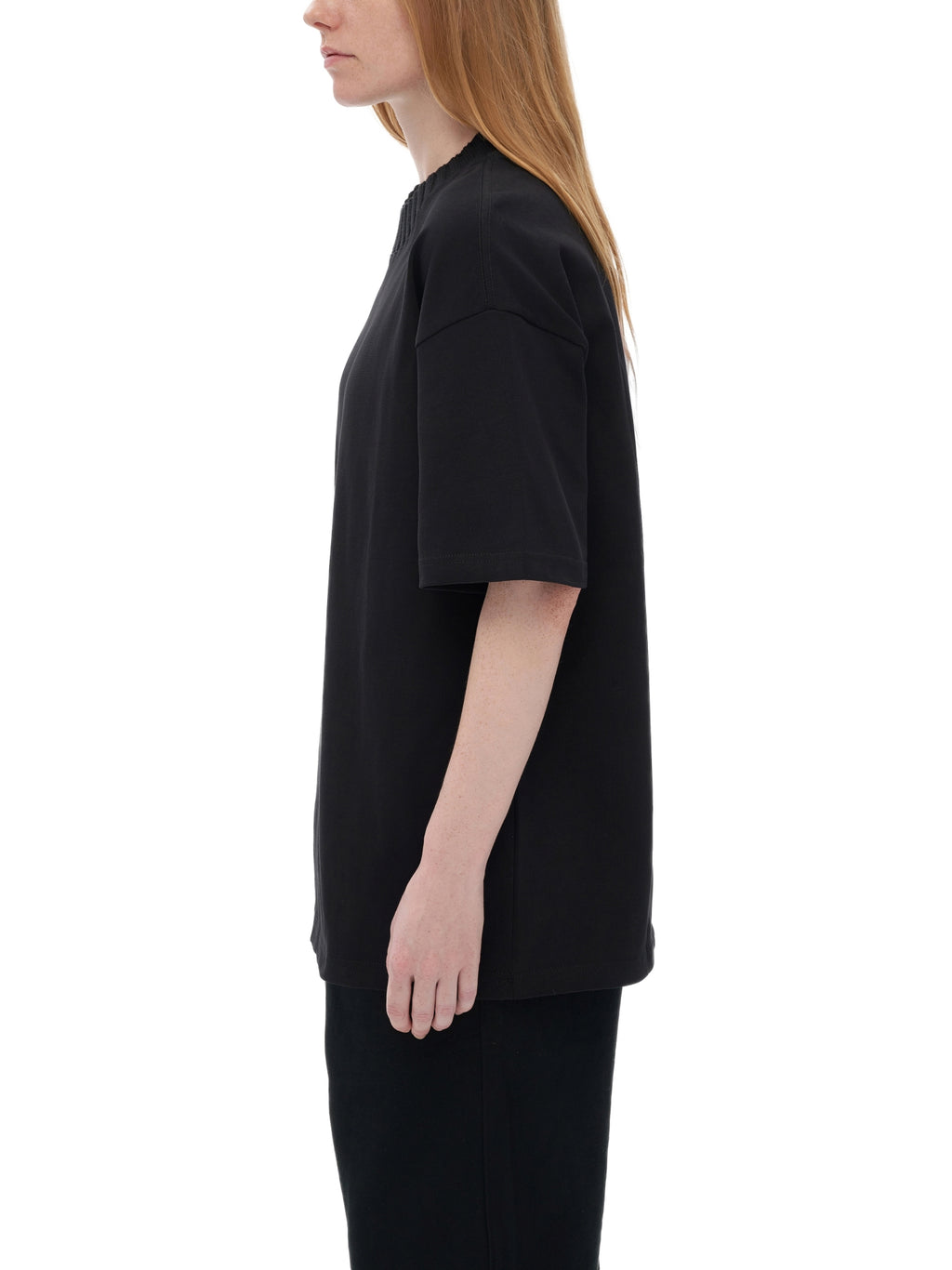 Unisex heavyweight knitted crewneck T-shirt in Black – side model view