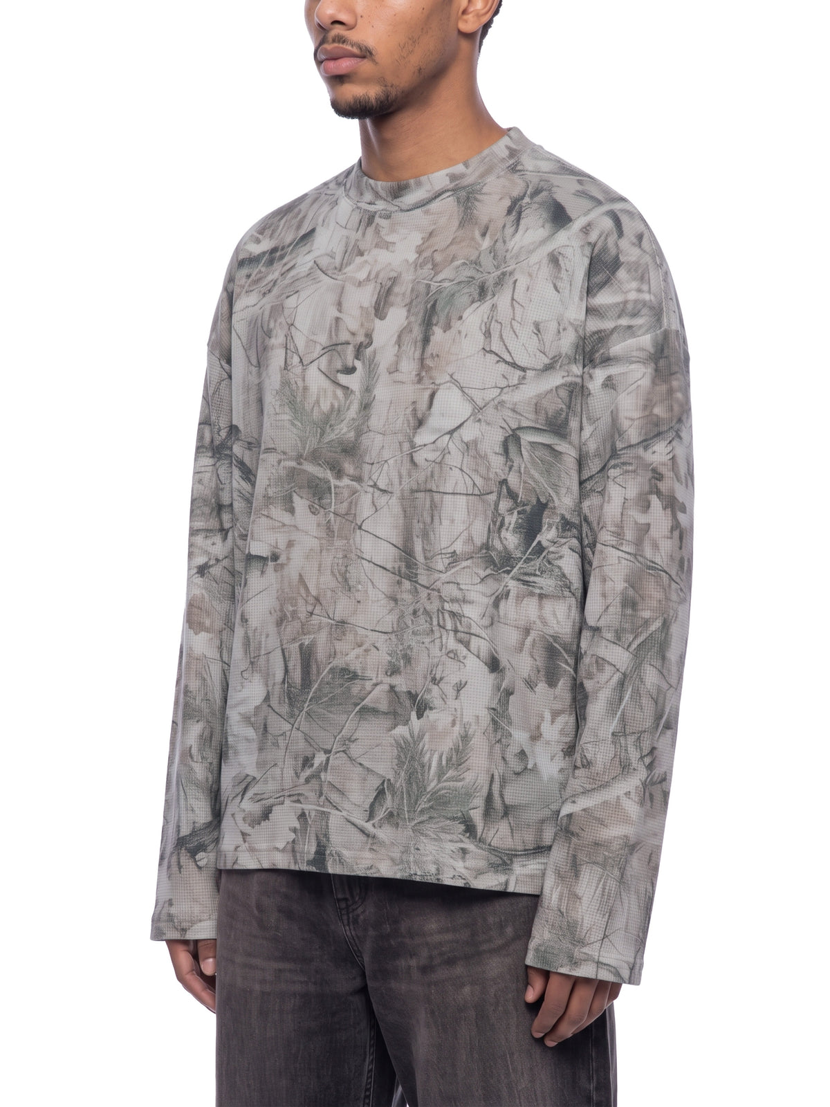 Unisex Tree Camo Waffle T-Shirt on male model front angle