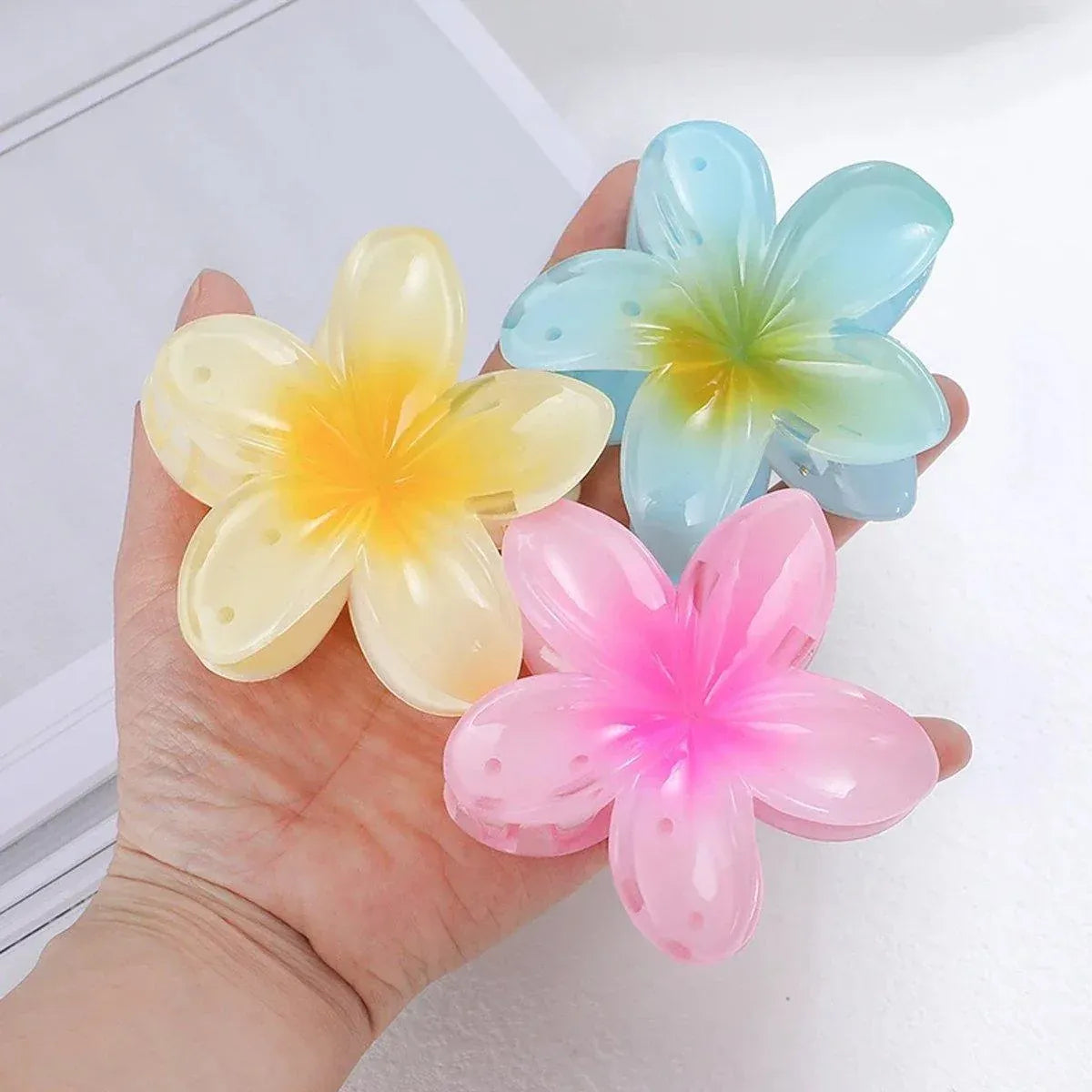 12-Piece Assorted Colour Frangipani Hair Clip Set — product photo 6 of 15