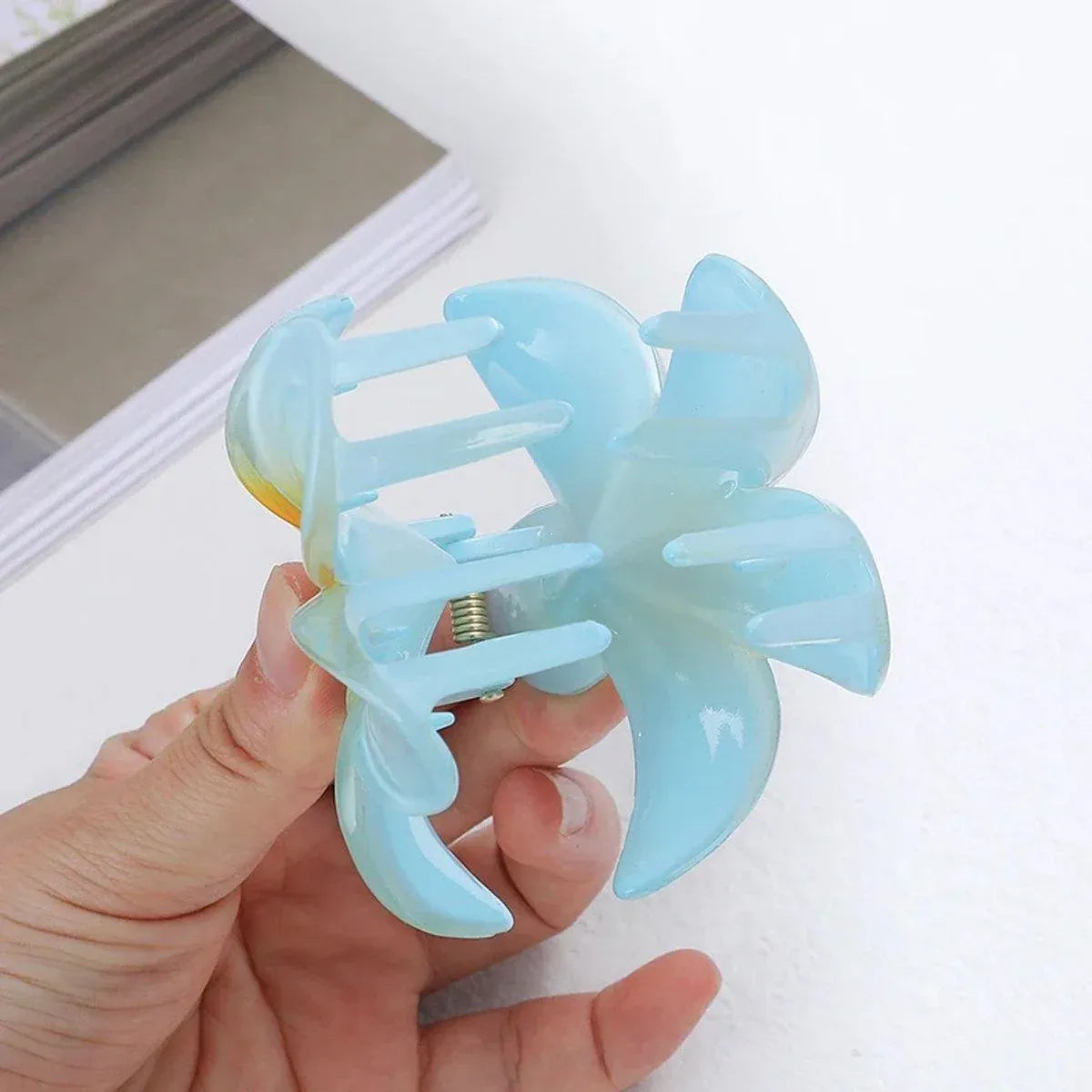 12-Piece Assorted Colour Frangipani Hair Clip Set — product photo 9 of 15