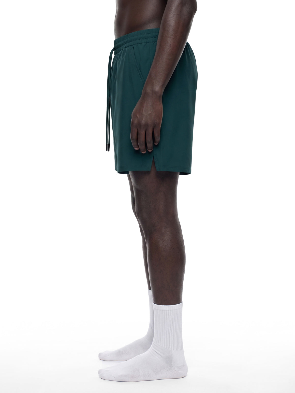 Men’s Performance Shorts deep teal model side view