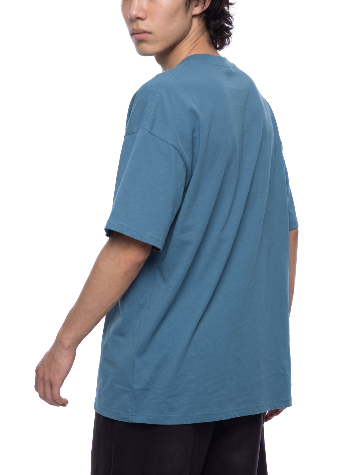 Unisex Oversized Drop Shoulder T-Shirt - Sky Blue male model back angle